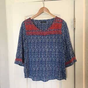 Blue Printed V-Neck Blouse with Red Trim